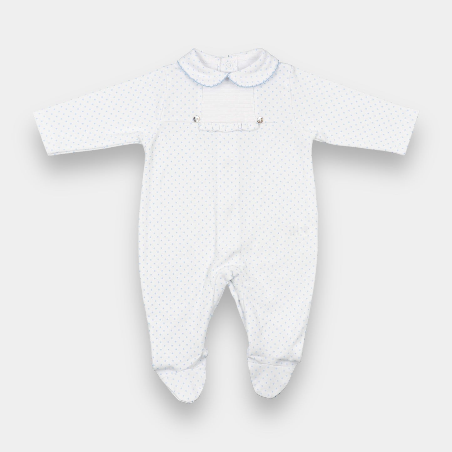 White sleep suit with blue polka dots. Front view