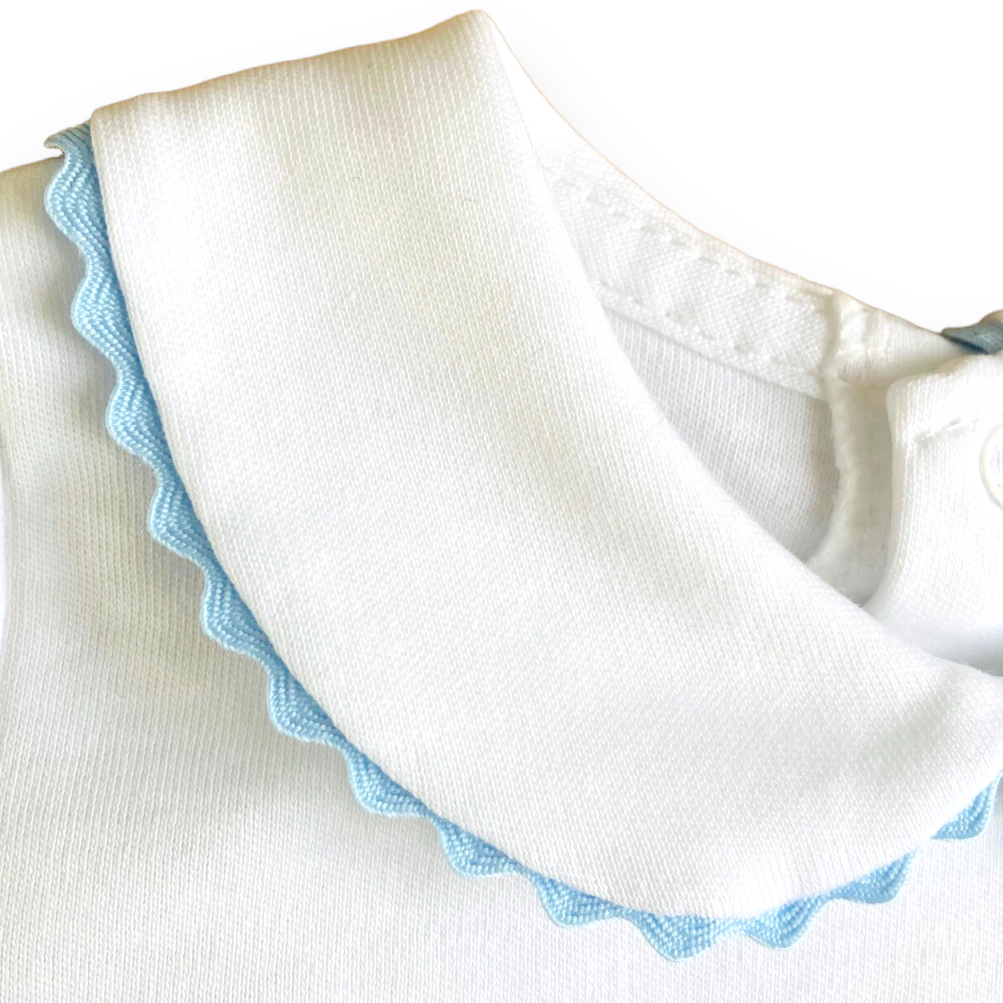 Baby vest with blue ric rac collar